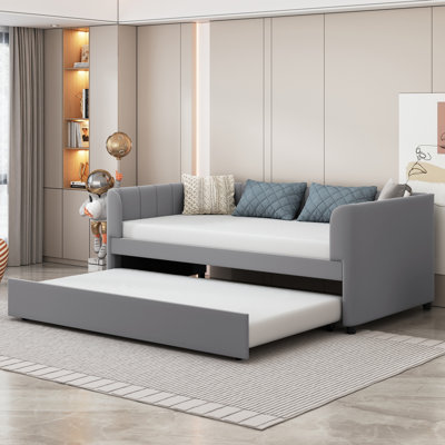 Lit de jour simple rembourré avec dossier ergonomique et lit gigogne, lit d'invité gris pour enfants ou petits espaces