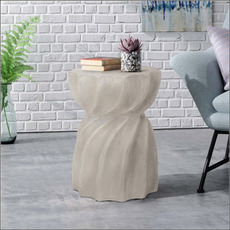 Élégante table d'appoint en béton légère avec dessus en forme de sablier et forme de sablier pour l'extérieur