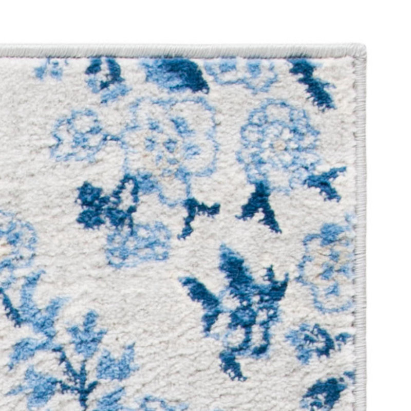 Blue and Cream Floral Synthetic 11' x 15' Area Rug
