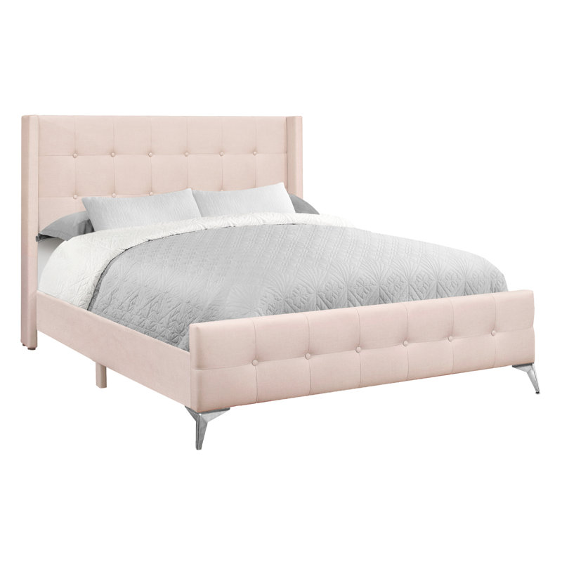 Lit chic en velours rose avec détails et pieds en métal