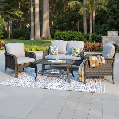 4-Piece Wicker Patio Conversation Set with Cushions and Glass Coffee Table