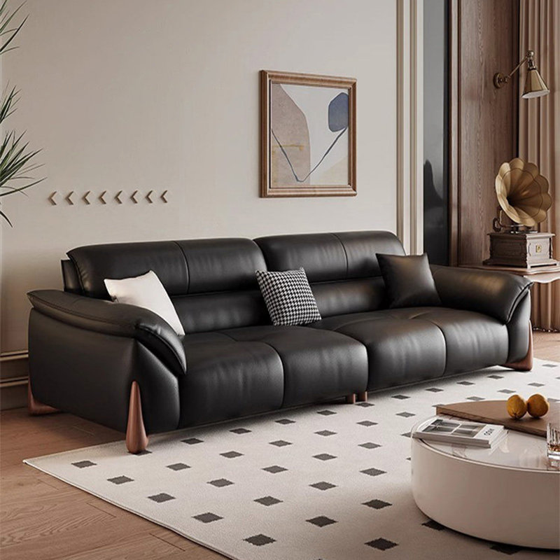 Causeuse-coussin modulable noire en cuir véritable