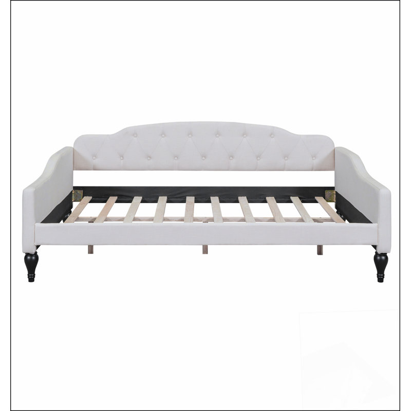 Lit de jour rembourré capitonné avec tissu en lin durable et design à oreilles, parfait pour les espaces de vie modernes