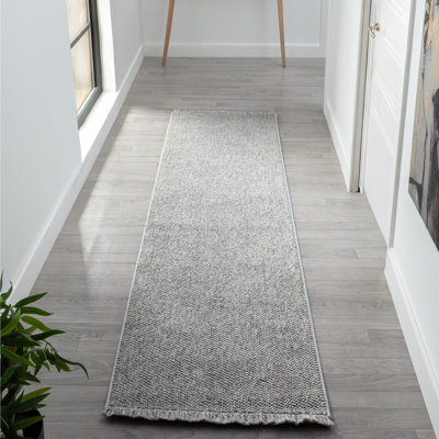 Tapis texturé à franges