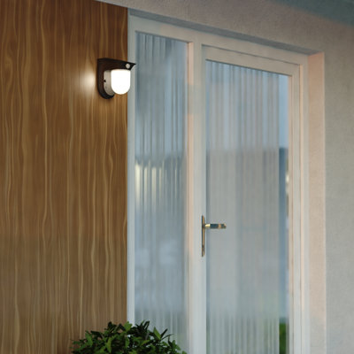 Dualux LED Battery Powered Dusk to Dawn Outdoor Security Area Light with Motion Sensor