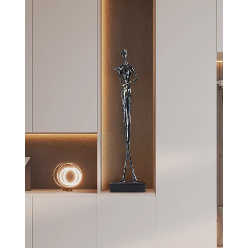 Figurine décorative moderne abstraite représentant une silhouette humaine debout, silhouette mince et artistique.