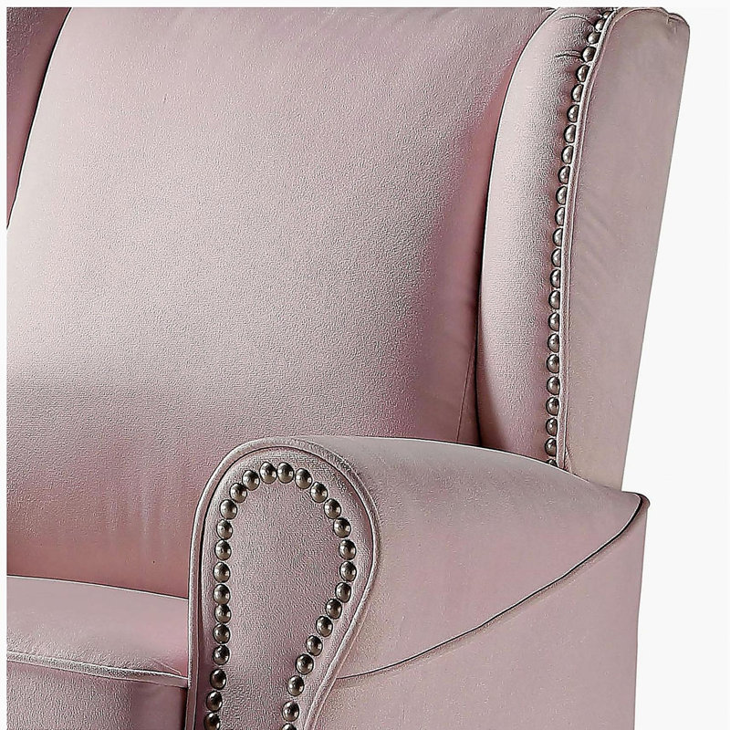 Fauteuil pivotant confortable à accoudoirs roulés avec garniture cloutée, revêtement en tissu rose pour des espaces de vie élégants