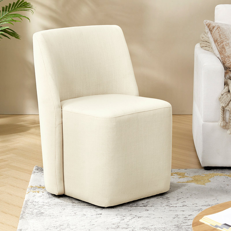 Leonas 32.75'' H Upholstered Dining Chair with Casters , Linen