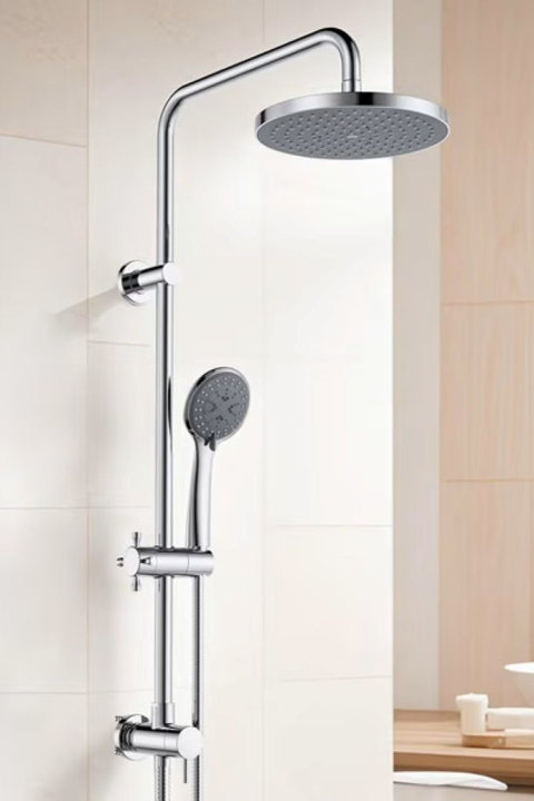 Chrome dual shower system featuring an overhead rainfall showerhead and a handheld shower spray mounted on a vertical slide bar against a tiled wall.