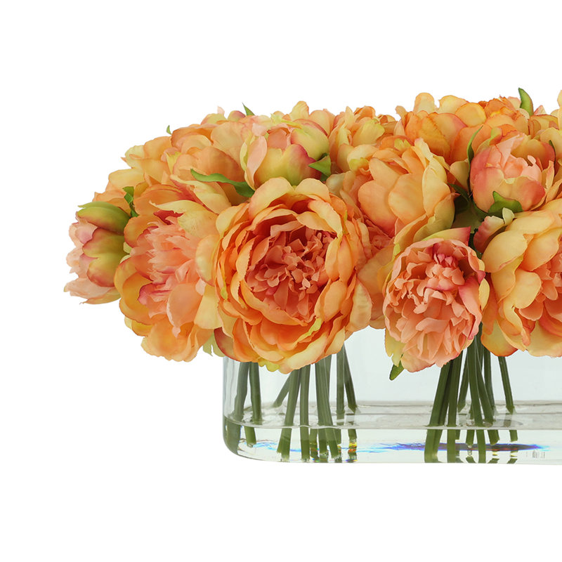 Pivoines disposées dans un vase en verre, Orange