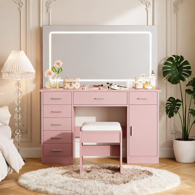 Coiffeuse moderne à DEL avec 7 tiroirs, miroir lumineux à 3 modes, station de chargement USB et support pour sèche-cheveux. Tabouret assorti inclus.