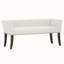 Banc rembourré compact et élégant avec dossier bas capitonné, accoudoirs évasés et tissu résistant en mélange polyester-lin pour une assise confortable.