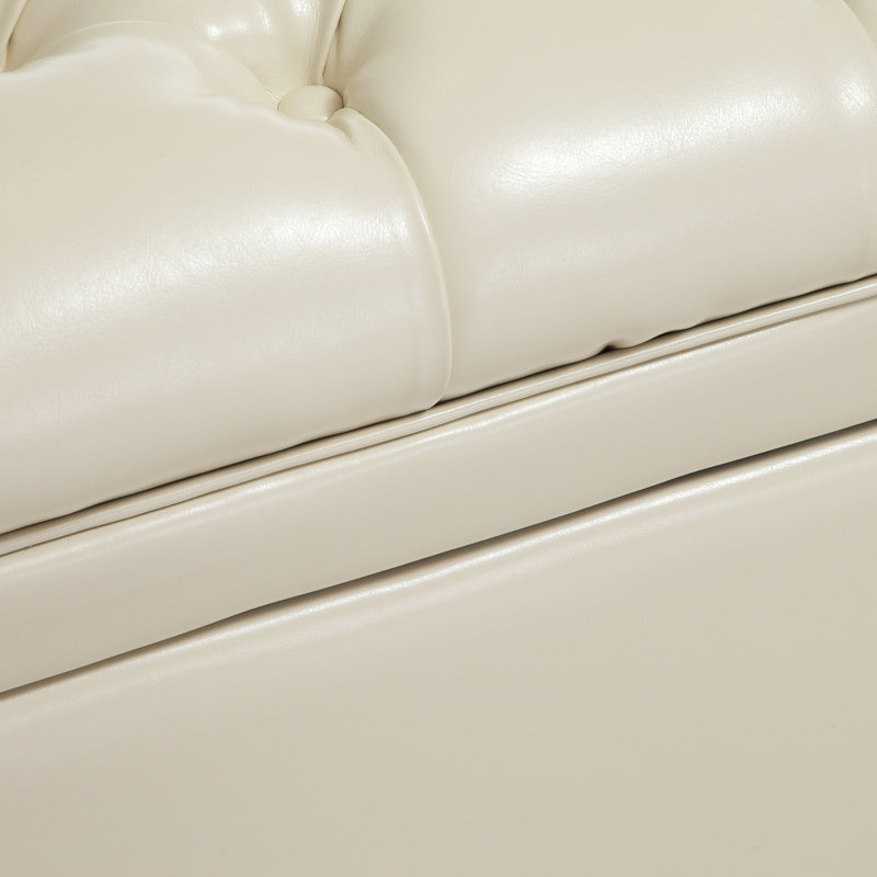 19.75'' Wide Tufted Rectangle Storage Ottoman Padded, button-tufted top stained legs Doubles as extra seating