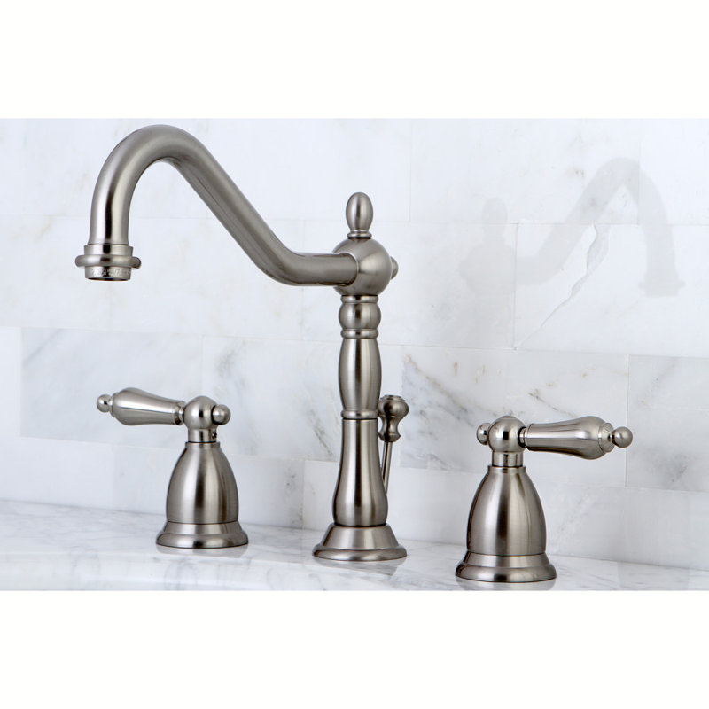 Kingston Brass Heritage Two-Handle 3-Hole Deck Mount Widespread Bathroom Faucet with Brass Pop-Up Drain
