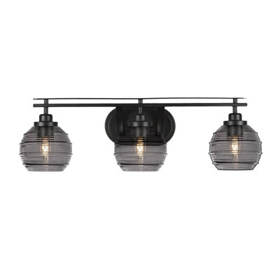 Barre d'éclairage de salle de bain 3 lumières Odyssey au fini noir mat avec verre de 6 po