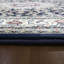 Tapis bleu/ivoire Attell-22281075
