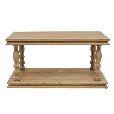 2-Tier Rustic Rectangular Coffee Table with Hand-Carved Baluster Legs, Natural Wood Finish, Spacious Lower Shelf for Storage and Display.