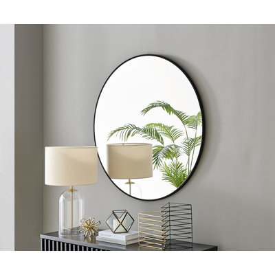 Alcantera Round Metal Frame Wall Mirror Simple and Elegant Modern Design