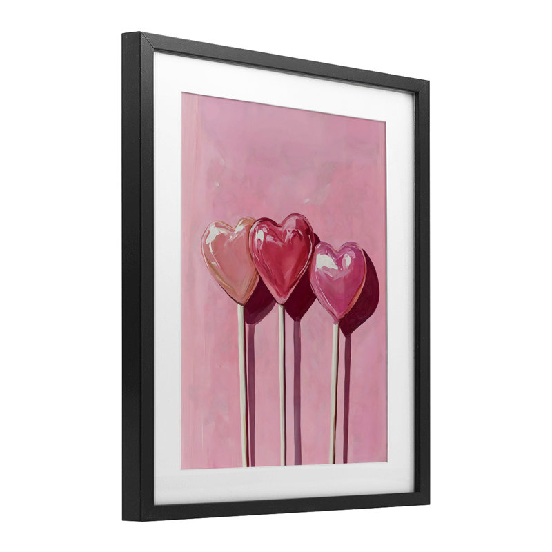 Trois sucettes sur fond rose, impression par Arlington Prints, H 16 po x l 13 po, Cadre noir minuit