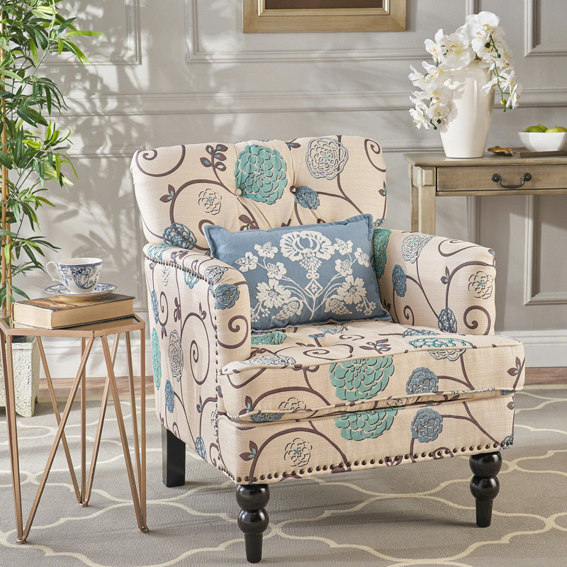 Exquis fauteuil capitonné Harrison au design contemporain, offrant confort, fonctionnalité et attrait intemporel pour les espaces de vie et de travail.