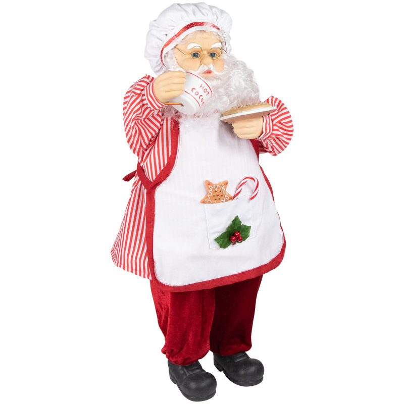 Chef avec figurine chocolat chaud et biscuit