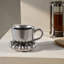 Tasse en grès avec soucoupe à bord sphérique