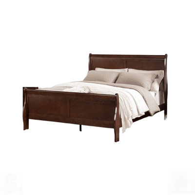 Lit en bois de style Louis Philippe avec pieds de support, parfait pour les chambres élégantes