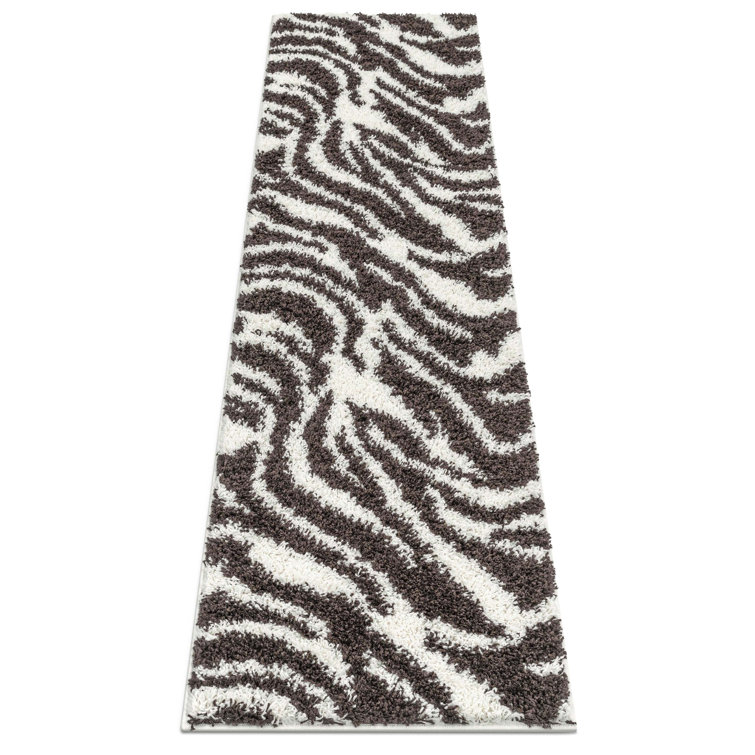 Dondre Performance Animal Print Indoor Rug