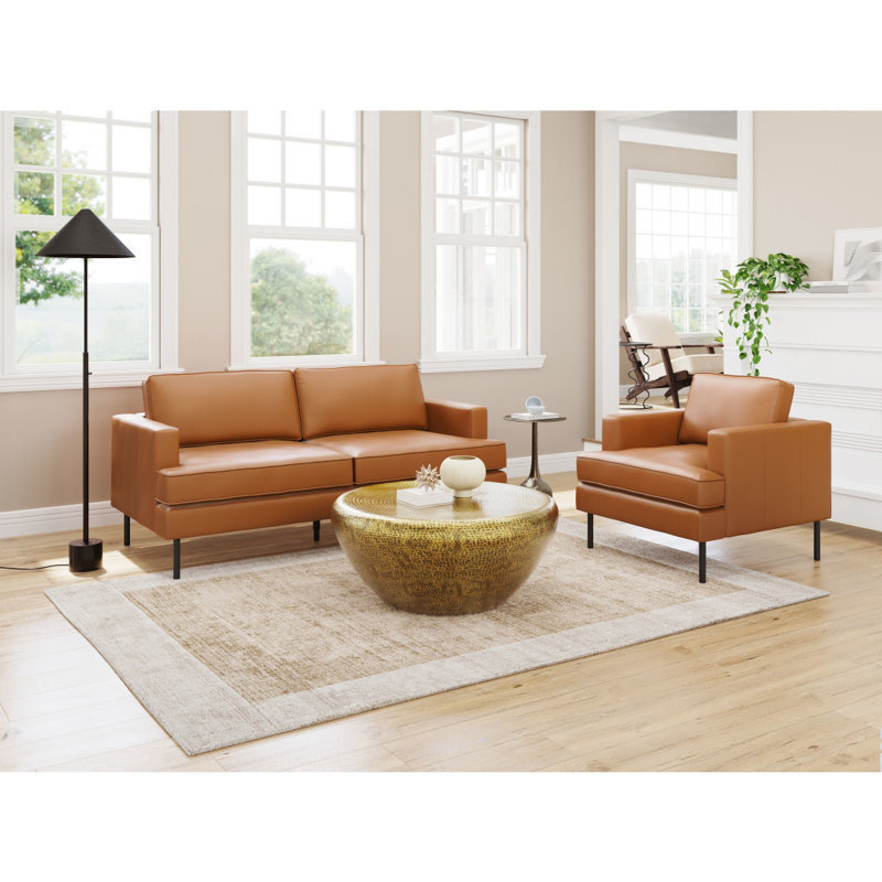 Fauteuil brun en similicuir rembourré