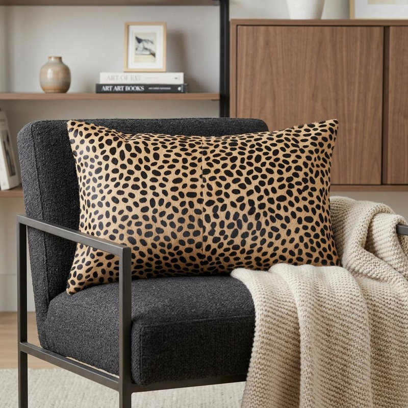 Coussin décoratif en peau de vache orange et noire 12 "X 20"