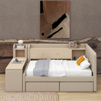 Lit de jour simple tapissier avec tiroirs, tablettes, armoires rabattables et table d'appoint