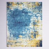 Tapis bleu et jaune à motif abstrait Coughlin