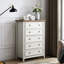 Armoire à commode beige à 5 tiroirs soigneusement conçue pour un rangement pratique et élégant
