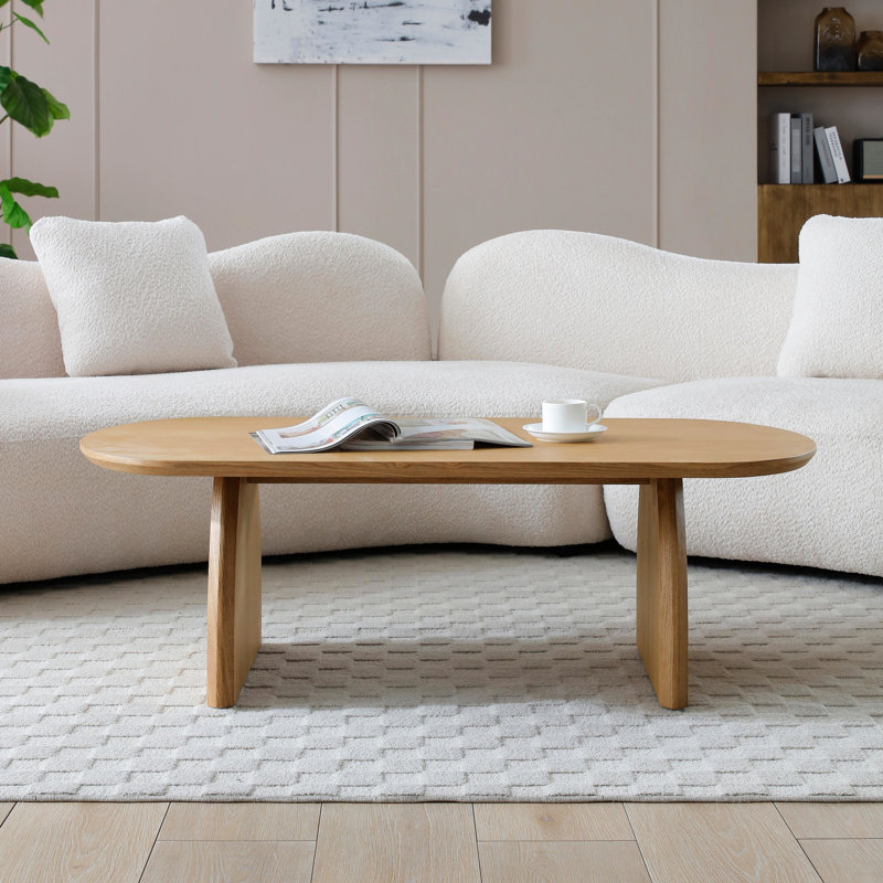 Table basse ovale en forme, support incurvé, sélectionné, surface lisse, convient à une table d'appoint relaxante avec base et plateau elliptique, matériau, atmosphère naturelle simple