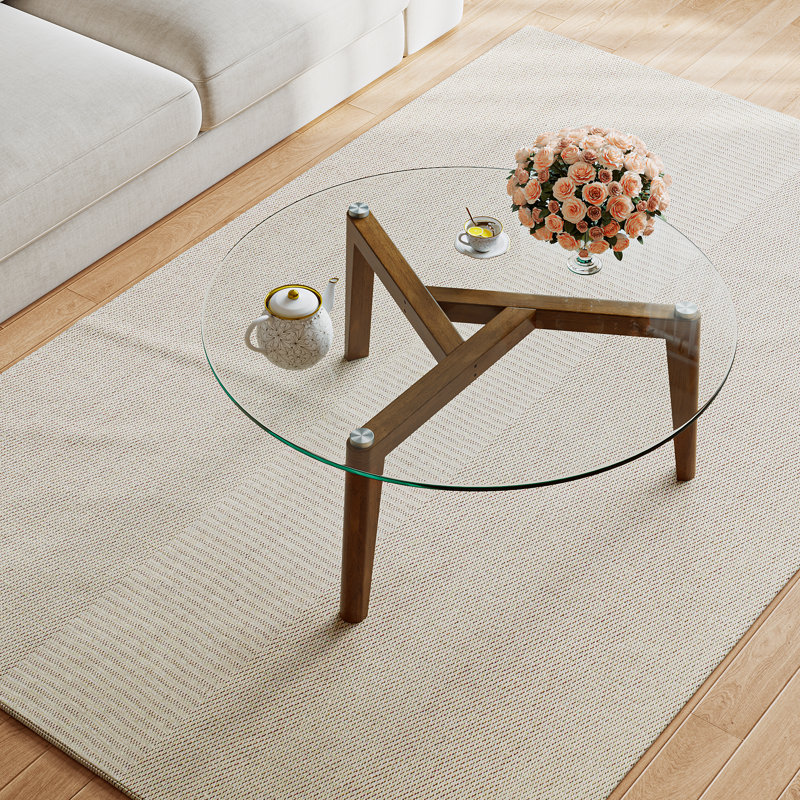 Table basse avec plateau en verre et structure en bois massif