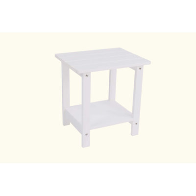 Une table d'appoint en bois imitation bois texturé, simple mais avec une texture riche, avec un petit plateau de table et convient aux pique-niques en plein air