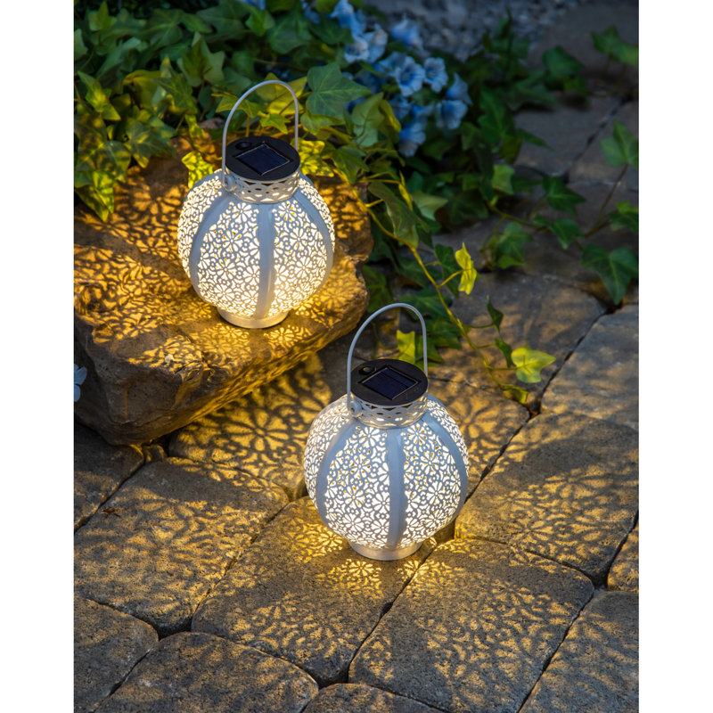 Lanterne solaire découpée avec art de jardin ombre