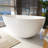 Spa-Like Freestanding Solid Surface Bathtub - 66.9" Deep Soaking Tub with Overflow