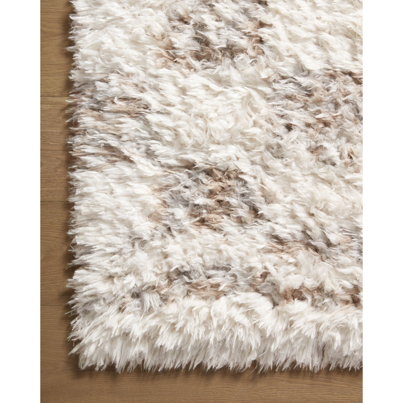 Ivory and Pebble Geometric Synthetic 7'-10" x 10' Area Rug