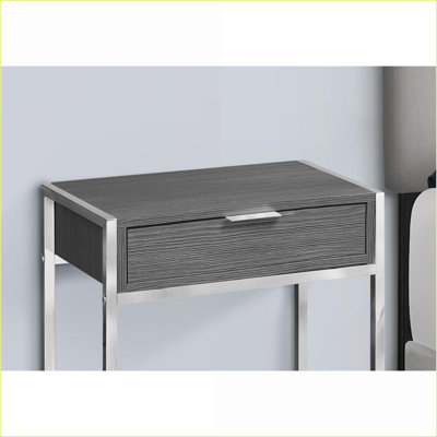 Table basse grise à grain de bois stratifié avec structure en métal chromé, rangement peu encombrant pour le salon