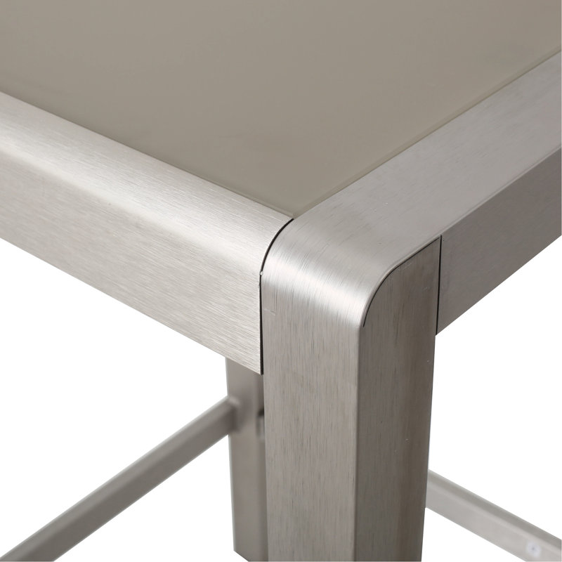 Table de bar d'extérieur grise avec structure en aluminium et plateau en verre givré, légère et résistante aux chocs.