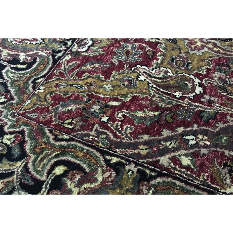 Suruchi Wool Oriental Area Rug in Purple/Black