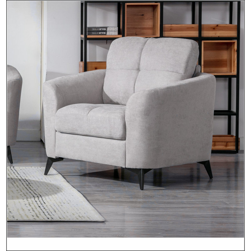Fauteuil capitonné en tissu gris clair