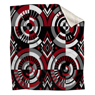Couvertures géométriques circulaires noires et rouges