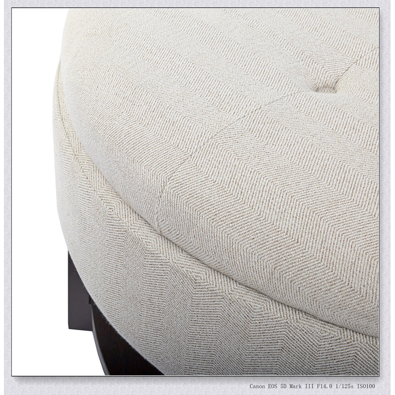 Repose-pieds capitonné rond en polyester