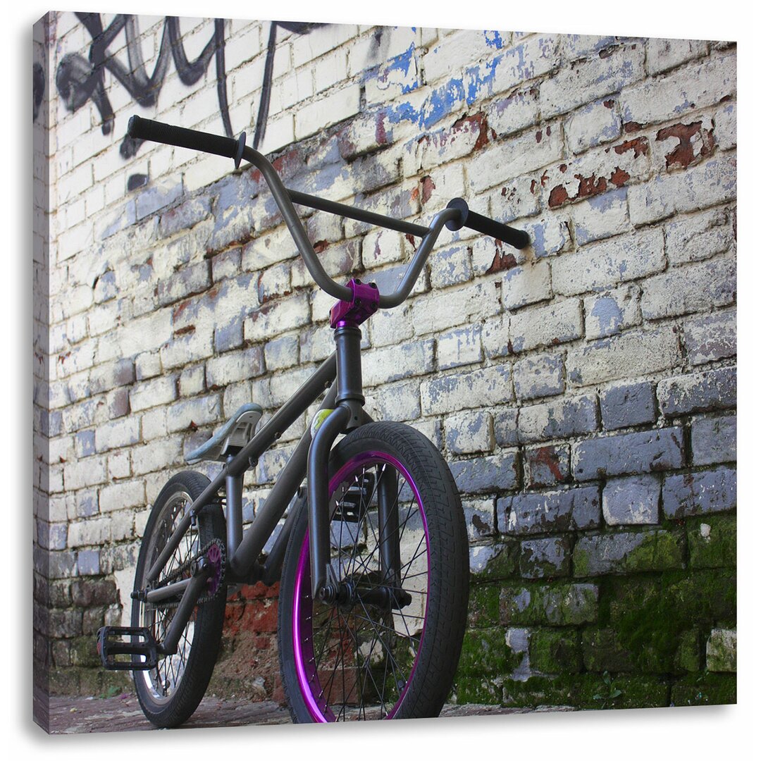 Leinwandbild Fahrrad vor Graffitiwand BMX Streetart