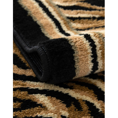 Testerman Animal Print Brown Area Rug