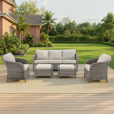 Arcola 5-Piece Outdoor Wicker Patio Enveloping Backrest Sofa Set With Swivel Chairs And Ottomans