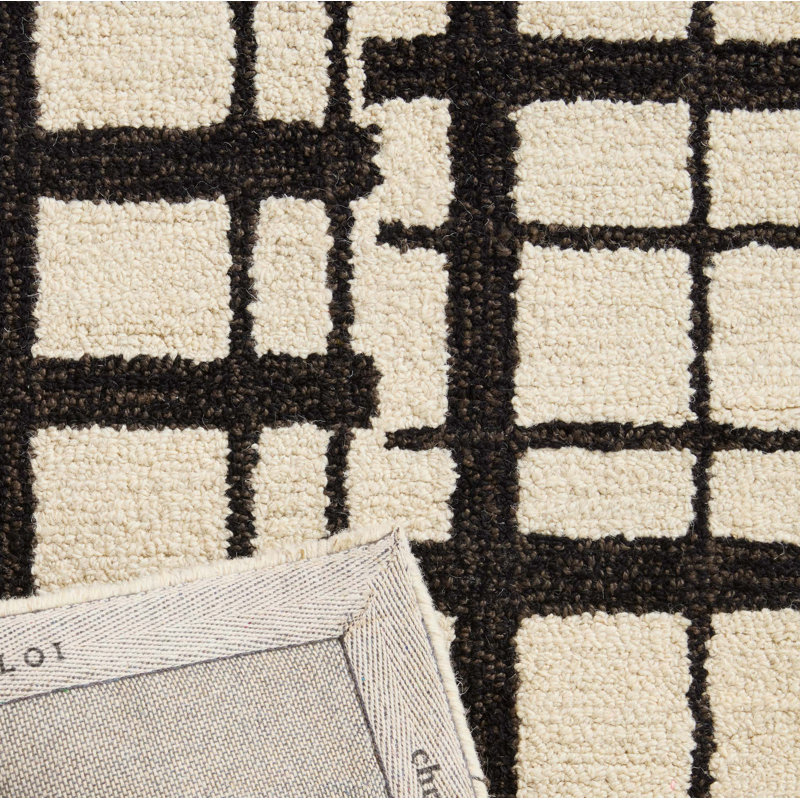 Tapis noir / ivoire en jute / sisal / laine touffeté à la main Chris x Loloi Polly par Chris Loves