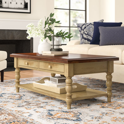 Table basse en bois massif avec rangement Courtdale